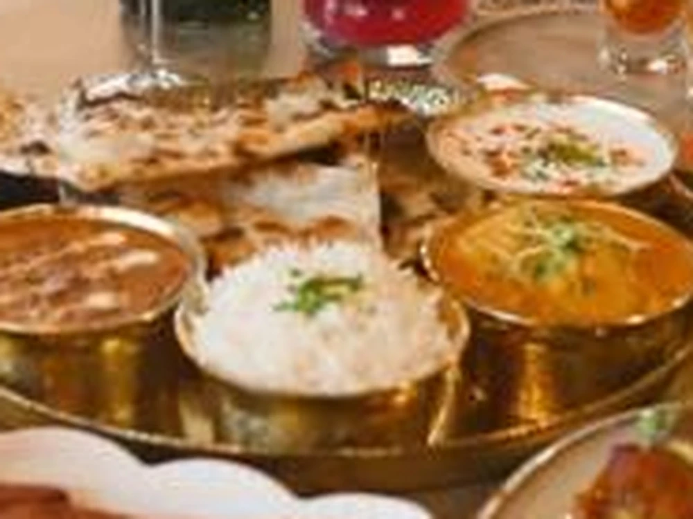 Junoon Thali delivery in Calgary NE from Cafe Junoon — full vegetarian thali platter